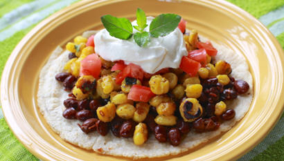 Mexican Style Grilled Corn with Black Beans and a Citrus Cream Sauce